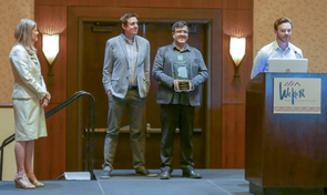 Chris Ortiz y Pino, who recently graduated from the UA with a master's degree in planning, accepts the 2017 Best Student Planning Project Award from the Arizona Chapter of the American Planning Association while UA faculty members Kelly Cederberg, Arlie Adkins and Eduardo Guerrero look on. Chris Ortiz y Pino, who recently graduated from the UA with a master's degree in planning, accepts the 2017 Best Student Planning Project Award from the Arizona Chapter of the American Planning Association while UA faculty members Kelly Cederberg, Arlie Adkins and Eduardo Guerrero look on.